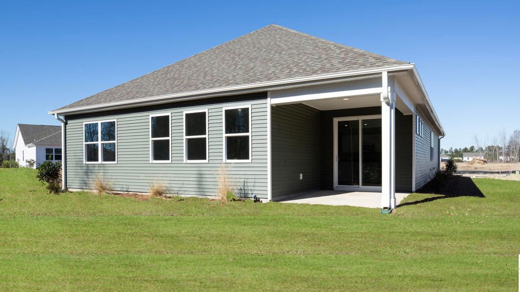 Front exterior of a new home in Surfside Landing, Hubert, NC, highlighting curb appeal (Image 2).