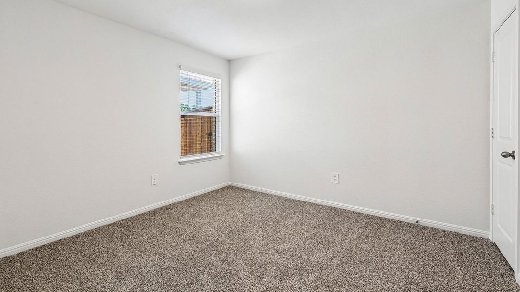 Spacious, unfurnished interior of a new home in Bar W Ranch, Leander (Image 26).