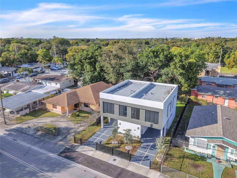 Front exterior of a new home in , Miami, FL, highlighting curb appeal (Image 31).