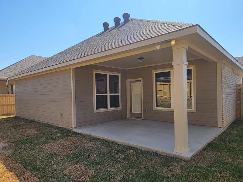 Exterior details and patio area of a home in , Brenham (Image 3).