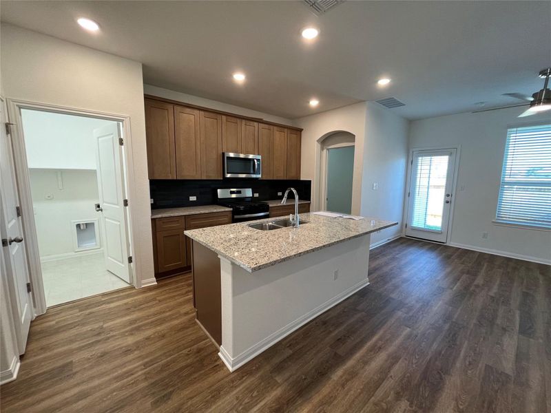Furnished interior view inside a new home in Wellspring, Round Rock (Image 7).