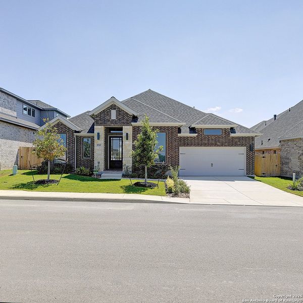 Front exterior of a new home in Kallison Ranch 60', San Antonio, TX, highlighting curb appeal (Image 15).