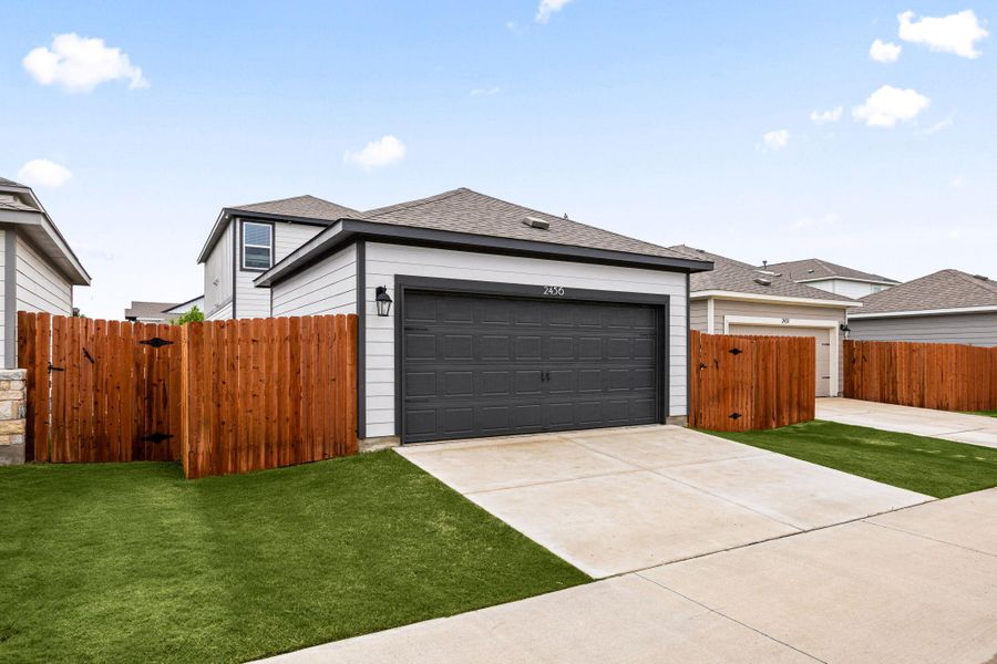 Front exterior of a new home in , Round Rock, TX, highlighting curb appeal (Image 24). Front exterior of a new home in , Round Rock, TX, highlighting curb appeal (Image 24).