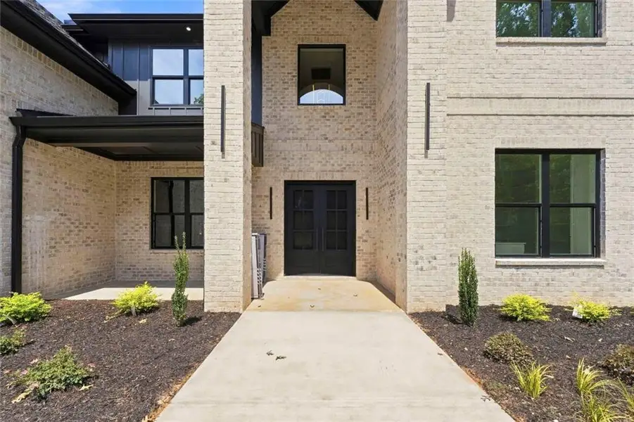 Exterior details and patio area of a home in , Loganville (Image 31).