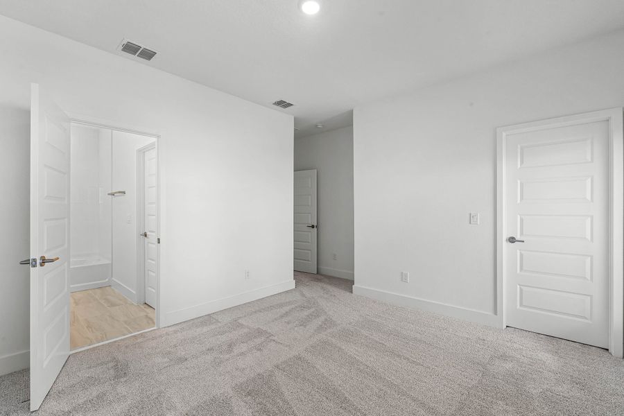 Spacious, unfurnished interior of a new home in Harvest at Ovation - Townhomes, Winter Garden (Image 24).