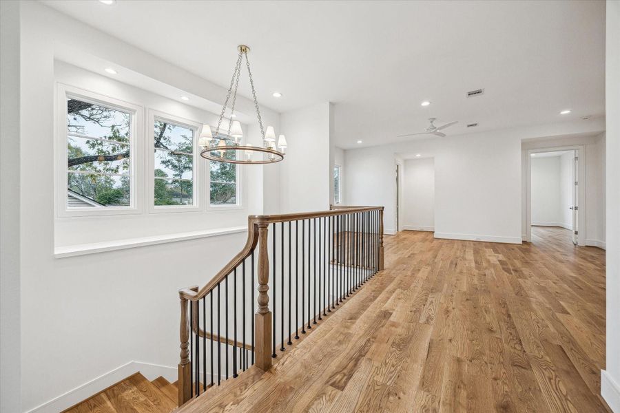 Upstairs Stair landing with great upper windows! Beautiful lighting and stair railing! Upstairs Stair landing with great upper windows! Beautiful lighting and stair railing!