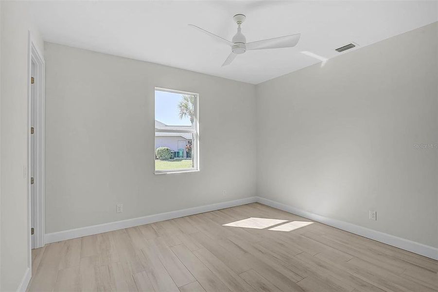 Spacious, unfurnished interior of a new home in , Port Charlotte (Image 30).