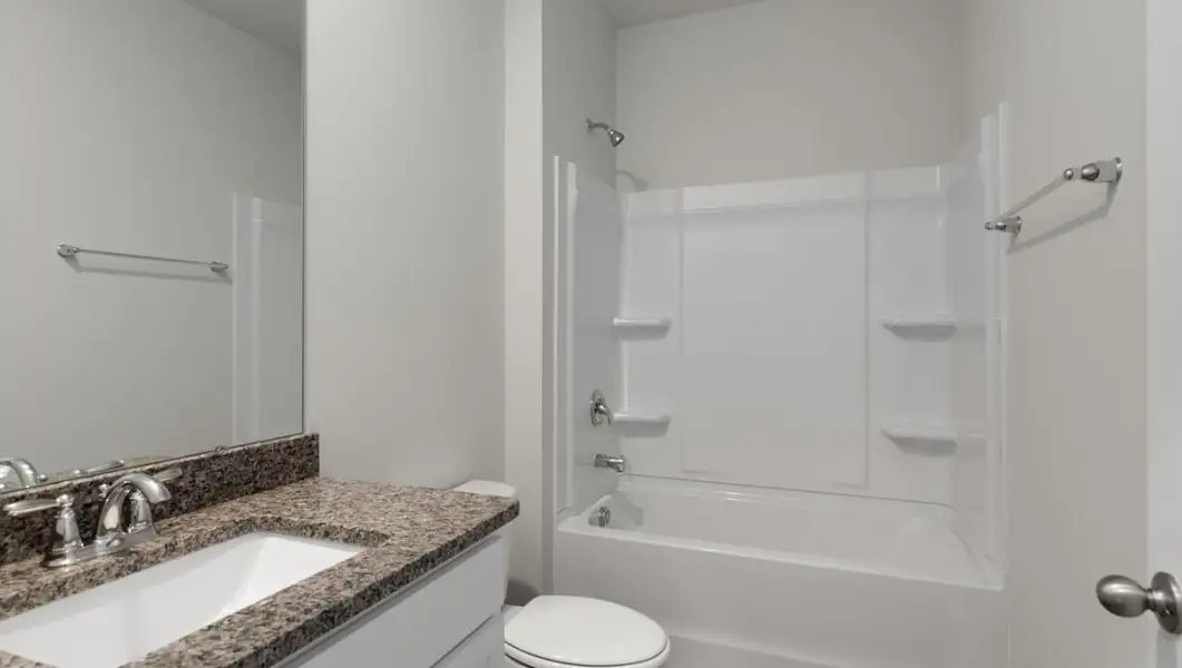 Representative furnished interior of a home built from the CALI by D.R. Horton in Halls Landing, Bolivia (Image 11).