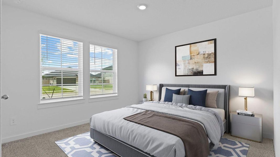 Furnished interior view inside a new home in Caldwell Crossing, Iowa Colony (Image 10).