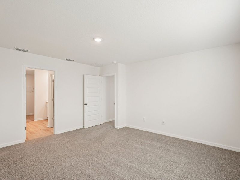 Spacious, unfurnished interior of a new home in Coasterra - Premier Series, Palmetto (Image 12).