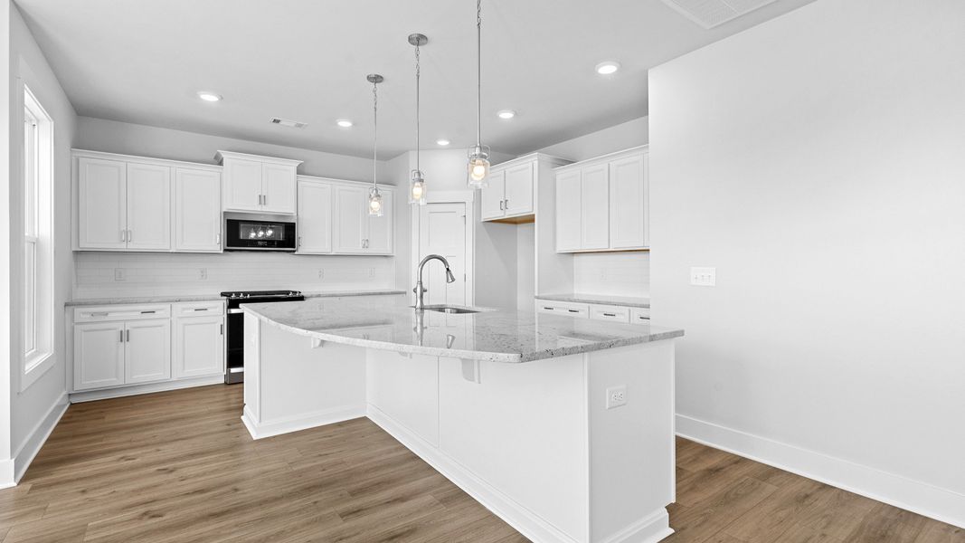 2 story single family home, all white, kitchen