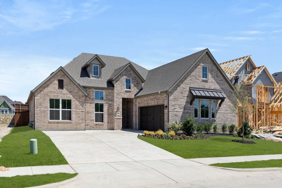 Representative exterior photo of a completed home built from the Henry- 70ft Home Site by Rockwell Homes in Nelson Lake Estates, Rockwall, TX (Image 29). Representative exterior photo of a completed home built from the Henry- 70ft Home Site by Rockwell Homes in Nelson Lake Estates, Rockwall, TX (Image 29).