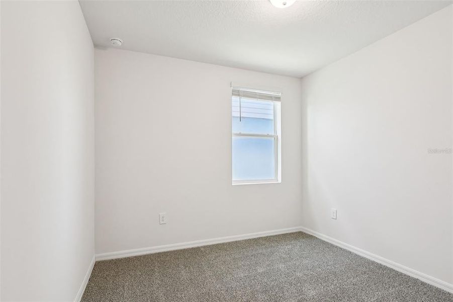 Spacious, unfurnished interior of a new home in Lake Deer Estates - Signature Series, Poinciana (Image 18).