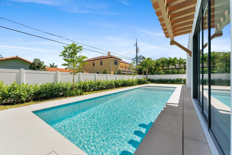 Front exterior of a new home in , Boca Raton, FL, highlighting curb appeal (Image 35). Front exterior of a new home in , Boca Raton, FL, highlighting curb appeal (Image 35).