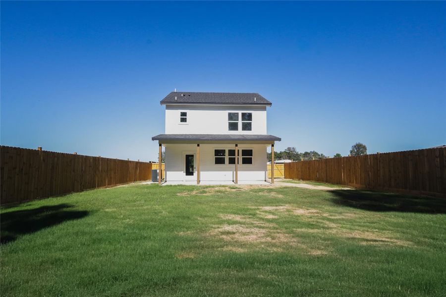 Front exterior of a new home in , Conroe, TX, highlighting curb appeal (Image 17).