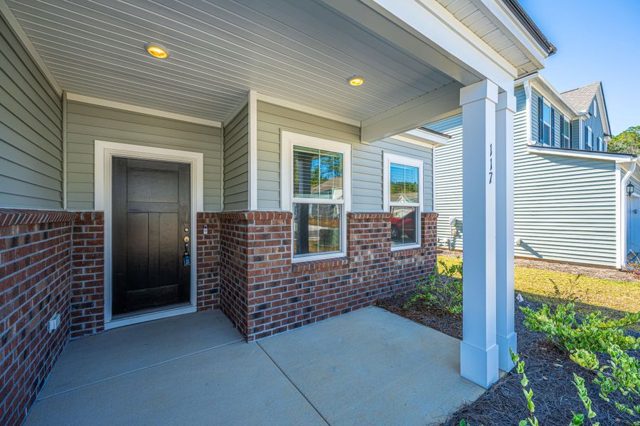 Exterior details and patio area of a home in Cedar Glen Preserve, Huger (Image 20).