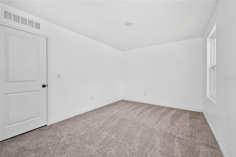 Spacious, unfurnished interior of a new home in , Port Charlotte (Image 38).