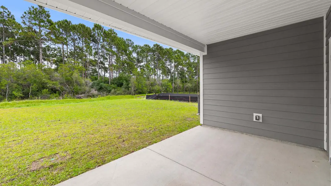Exterior details and patio area of a home in Buffer Farms, Port Saint Joe (Image 4). Exterior details and patio area of a home in Buffer Farms, Port Saint Joe (Image 4).