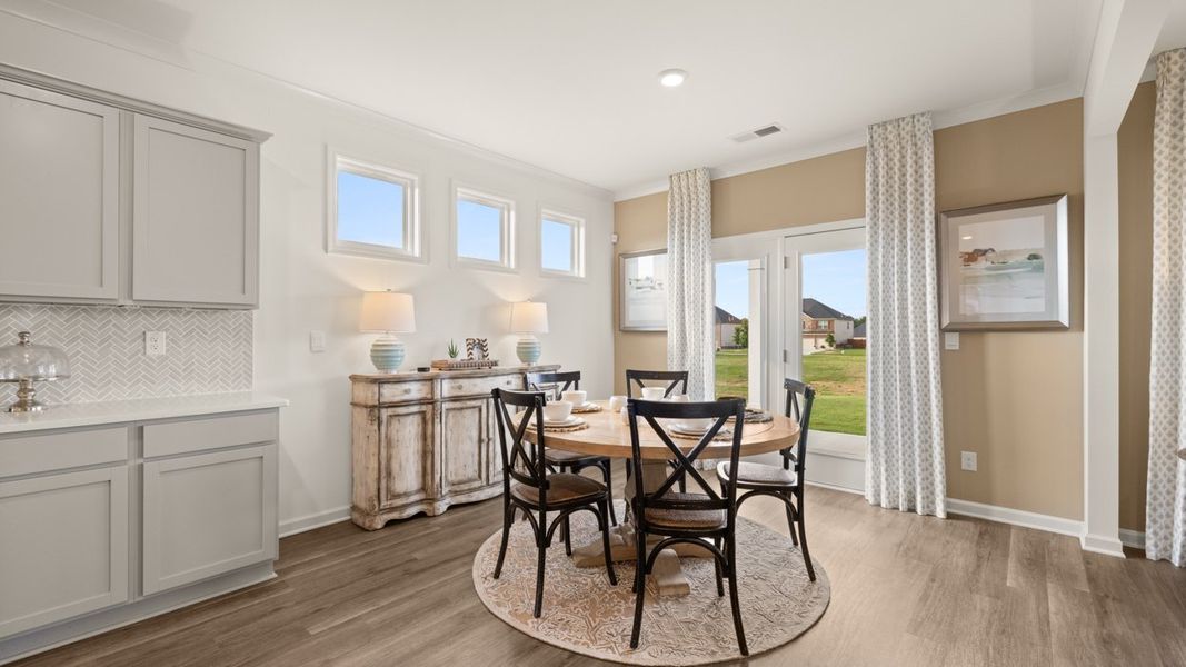 Representative furnished interior of a home built from the Holbrook by D.R. Horton in Independence, Loganville (Image 9).