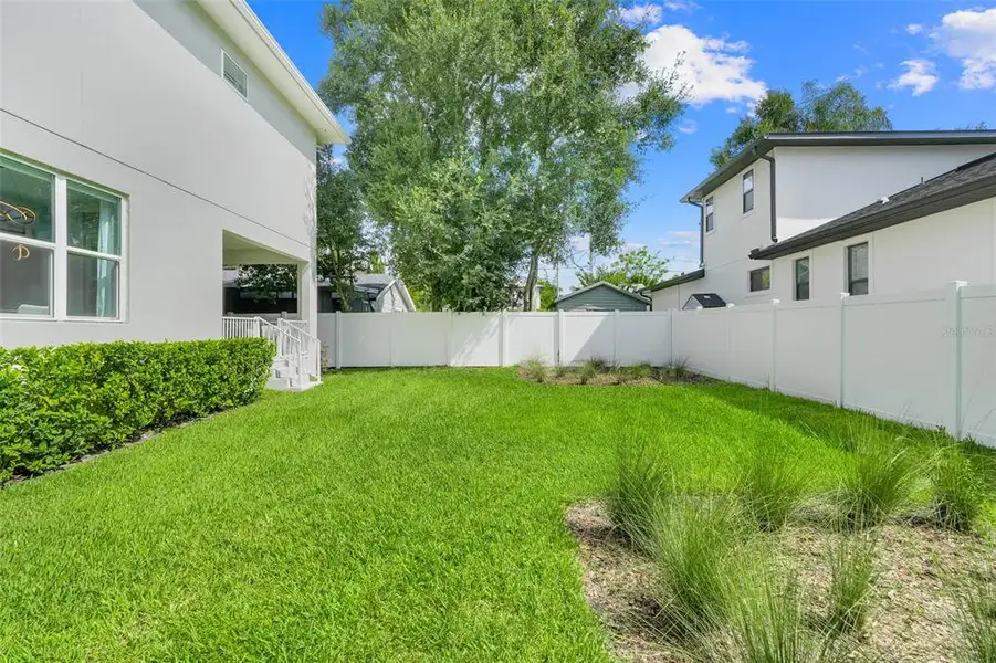 Exterior details and patio area of a home in , Orlando (Image 1).