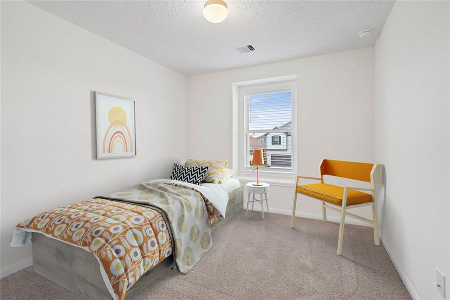 Secondary bedroom features plush carpet, neutral paint, lighting, a large window with privacy blinds and ample sized closet space.