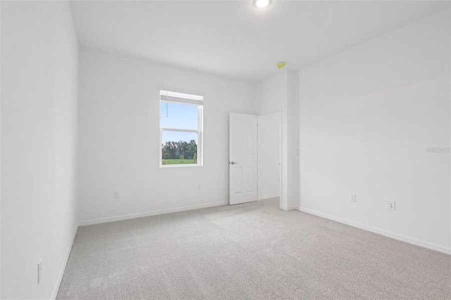 Spacious, unfurnished interior of a new home in Eagletail Landings, Howey-in-the-Hills (Image 34).