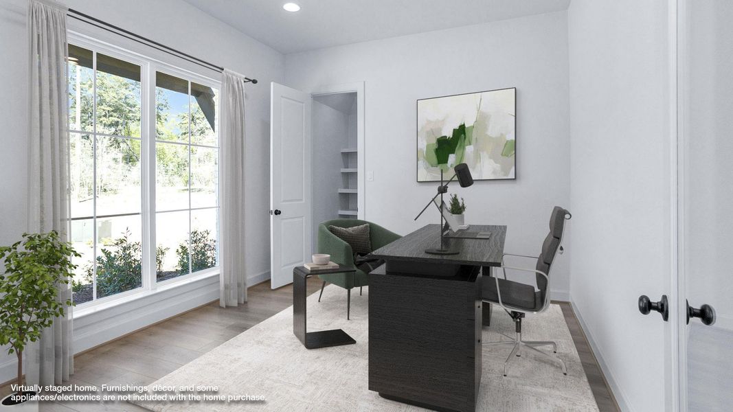 Office featuring baseboards, recessed lighting, wood finished floors, and a healthy amount of sunlight Office featuring baseboards, recessed lighting, wood finished floors, and a healthy amount of sunlight