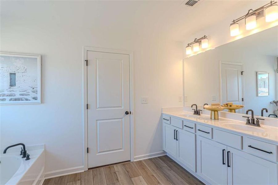 Furnished interior view inside a new home in The Pointe at Heron Bay, Locust Grove (Image 4).