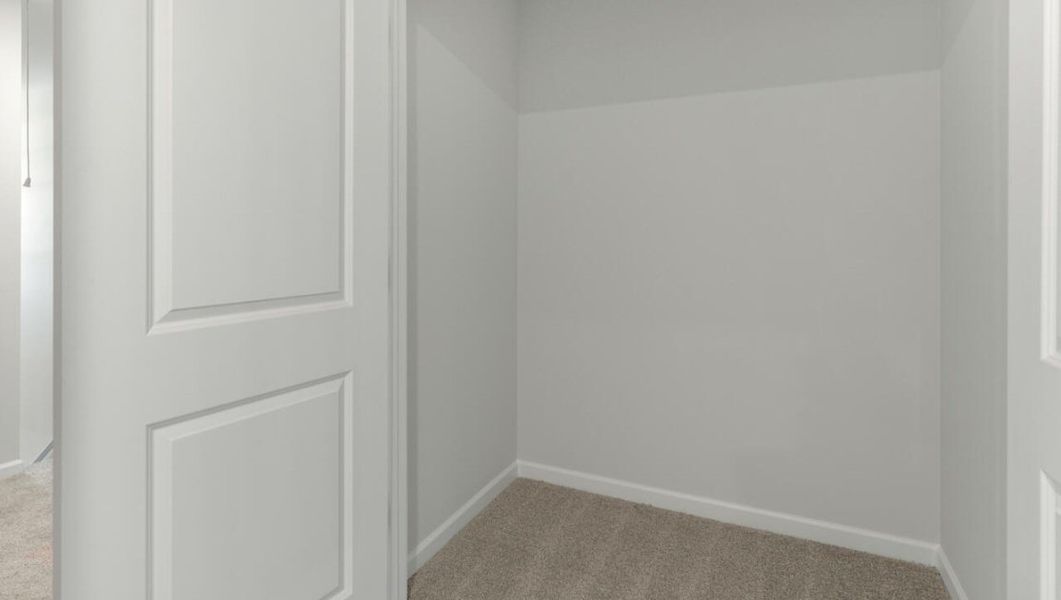 Representative unfurnished interior of a home built from the PEARSON TH by D.R. Horton in Grayson Park Duets, Leland (Image 21).