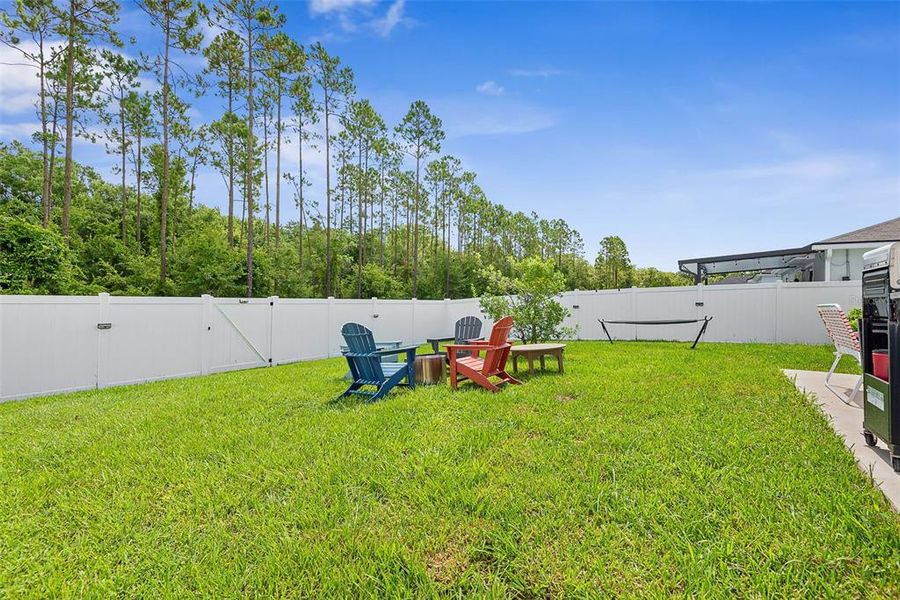 Exterior details and patio area of a home in Sawmill Branch, Palm Coast (Image 3).