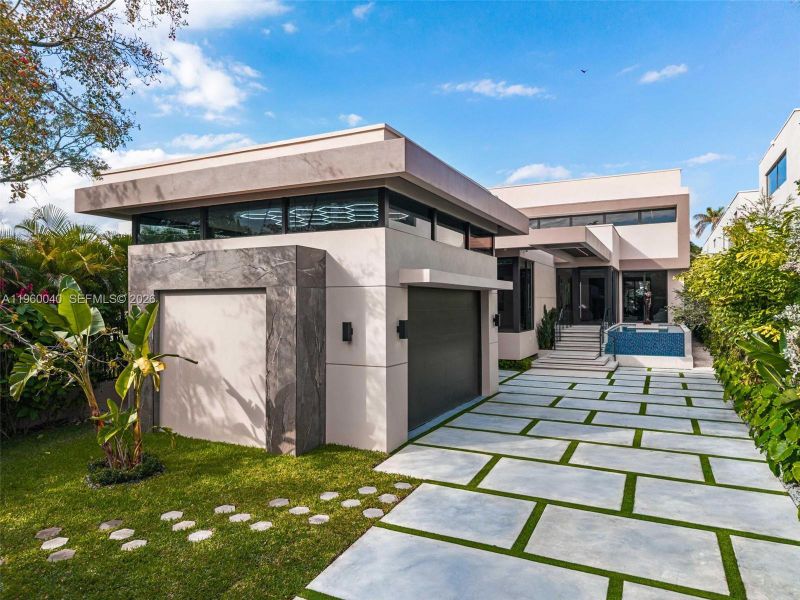 Front exterior of a new home in , Miami, FL, highlighting curb appeal (Image 1). Front exterior of a new home in , Miami, FL, highlighting curb appeal (Image 1).