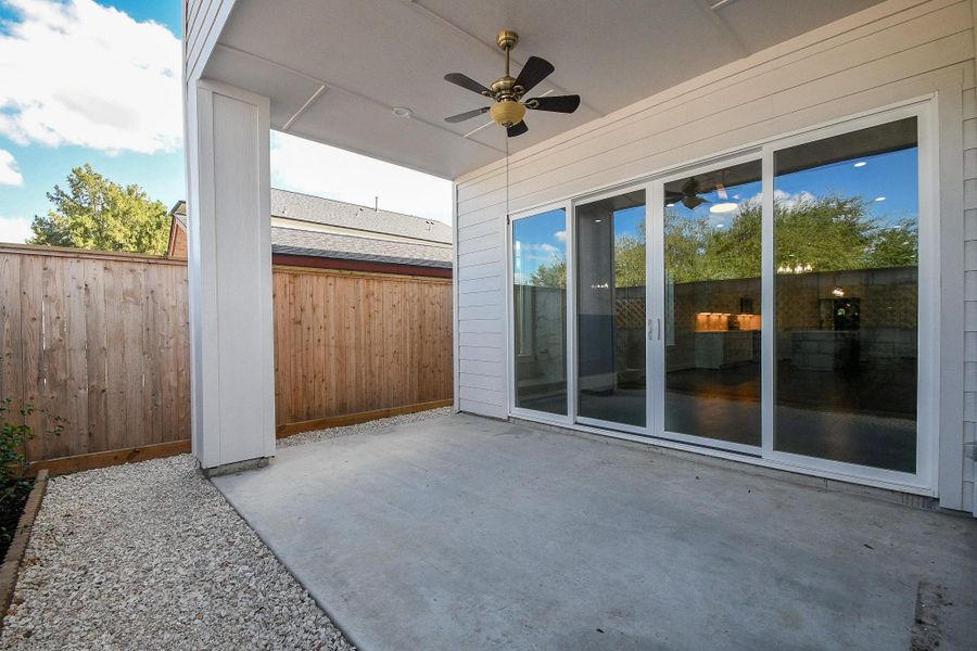 Exterior details and patio area of a home in , Houston (Image 3).