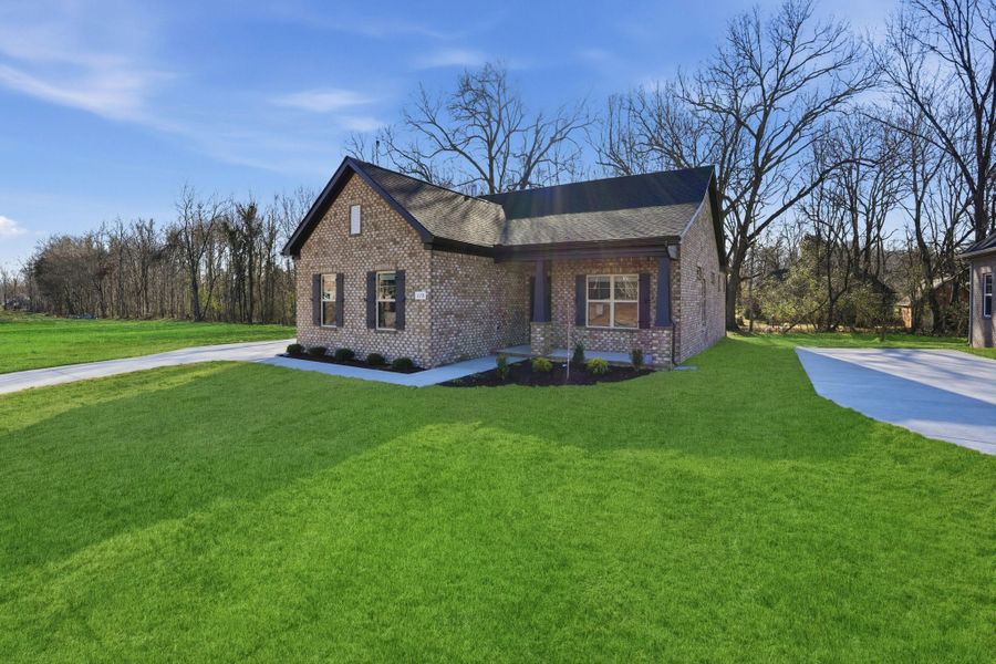 Front exterior of a new home in Sagewood, Tullahoma, TN, highlighting curb appeal (Image 5).