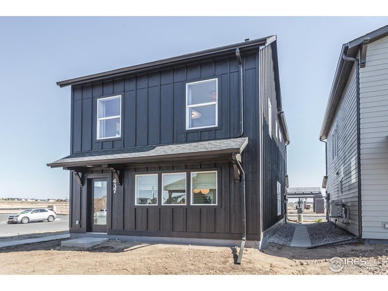 Exterior details and patio area of a home in Prairie Song Story Collection - Single Family Homes, Windsor (Image 21).