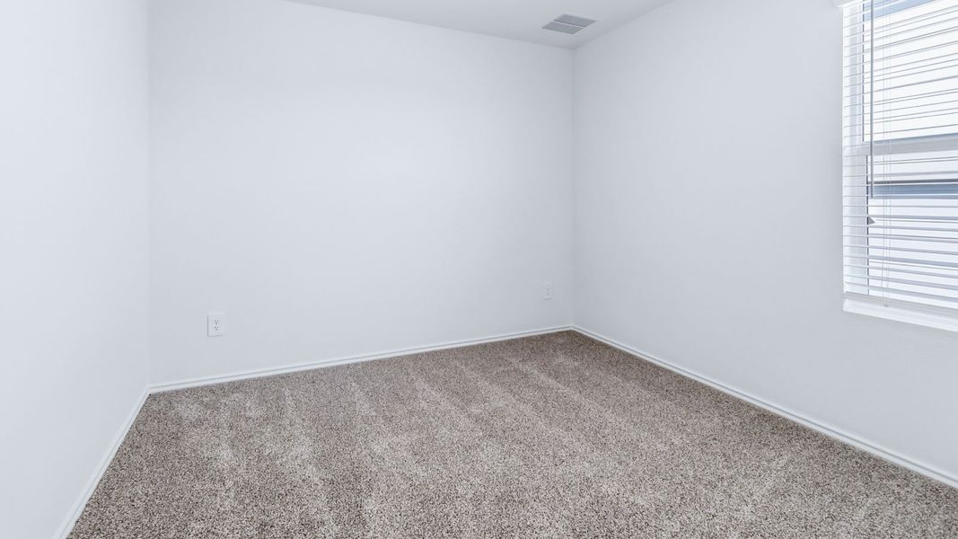 Representative unfurnished interior of a home built from the The Easton by D.R. Horton in Wayside, Uhland (Image 27).