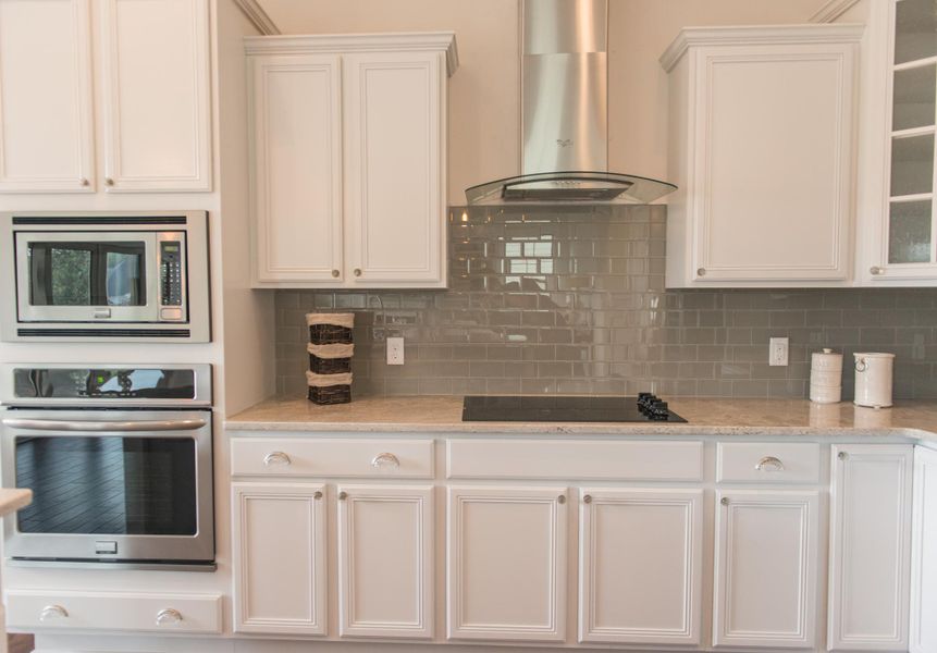 Representative furnished interior of a home built from the Lanai by Bill Clark Homes in The Sanctuary at Sunset Beach, Sunset Beach (Image 16). Representative furnished interior of a home built from the Lanai by Bill Clark Homes in The Sanctuary at Sunset Beach, Sunset Beach (Image 16).