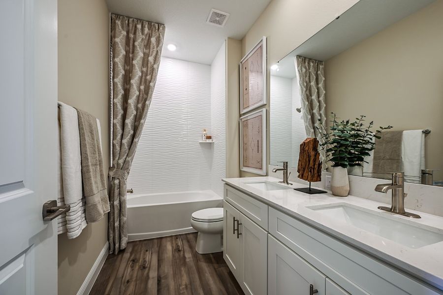Representative furnished interior of a home built from the Mariposa by Casa Fresca Homes in Mirada, San Antonio (Image 18).