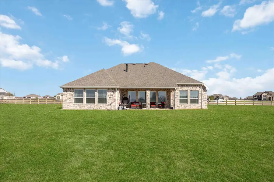 Exterior details and patio area of a home in , Waller (Image 32).