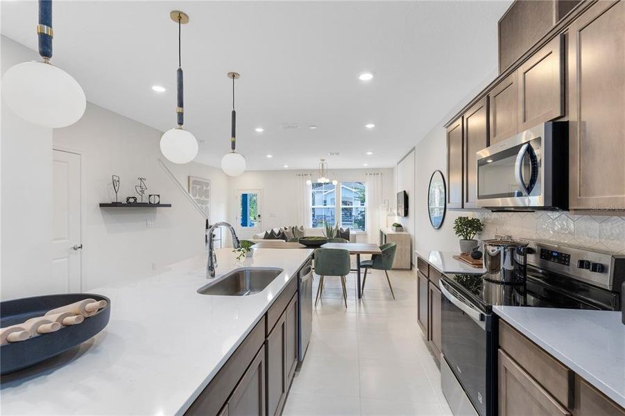 Furnished interior view inside a new home in The Cove at Nona Sound, Orlando (Image 8). Furnished interior view inside a new home in The Cove at Nona Sound, Orlando (Image 8).
