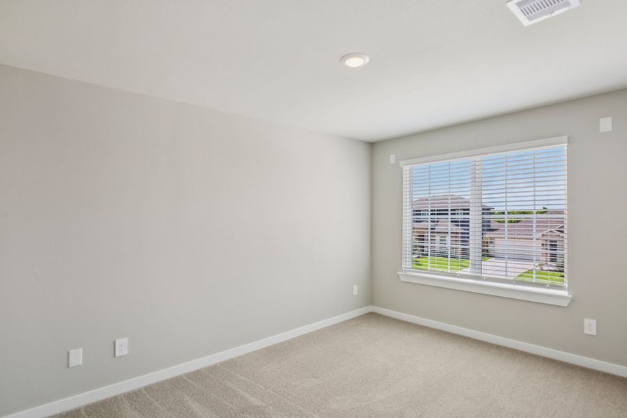 Spacious, unfurnished interior of a new home in Granger Pointe - Premier Series, Conroe (Image 8).