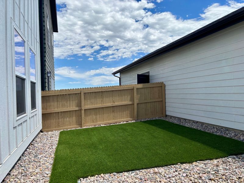 Exterior details and patio area of a home in Prairie Song, Windsor (Image 4). Exterior details and patio area of a home in Prairie Song, Windsor (Image 4).