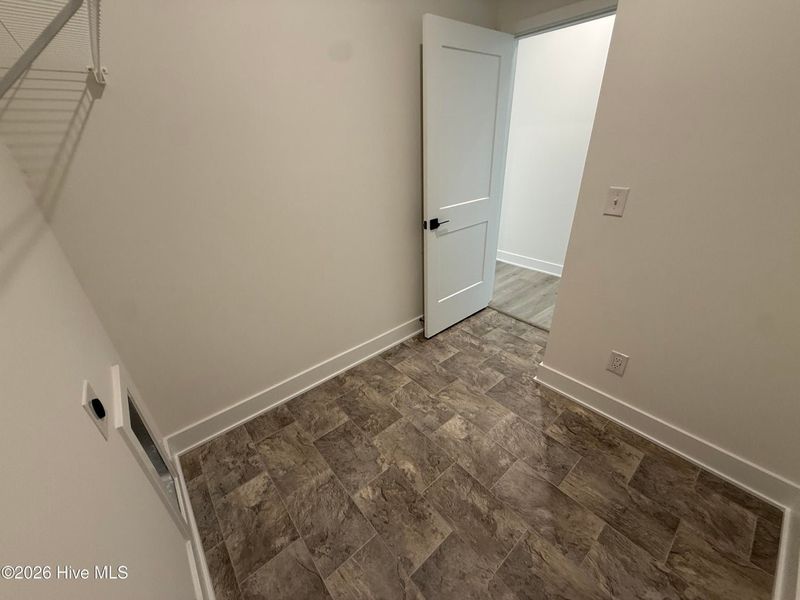 Spacious, unfurnished interior of a new home in Wood Creek Landing, Leland (Image 38). Spacious, unfurnished interior of a new home in Wood Creek Landing, Leland (Image 38).