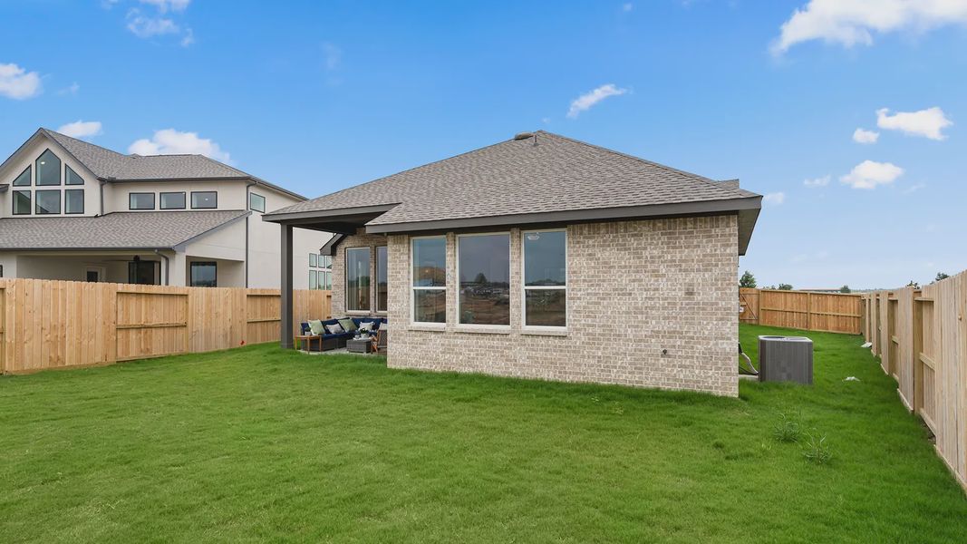 Representative exterior details of a home built from the Hillcrest by Chesmar Homes in Artavia, Conroe (Image 4).