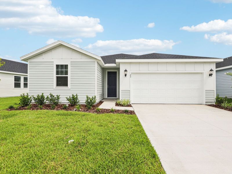 Front exterior of a new home in Flagler Village - Signature Series, Palm Coast, FL, highlighting curb appeal (Image 20).