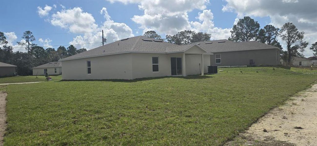 Exterior details and patio area of a home in Poinciana, Poinciana (Image 4).