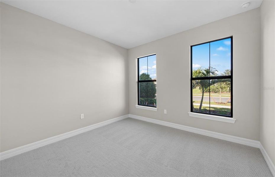 Spacious, unfurnished interior of a new home in Cedar Grove at The Woodlands, North Port (Image 15).