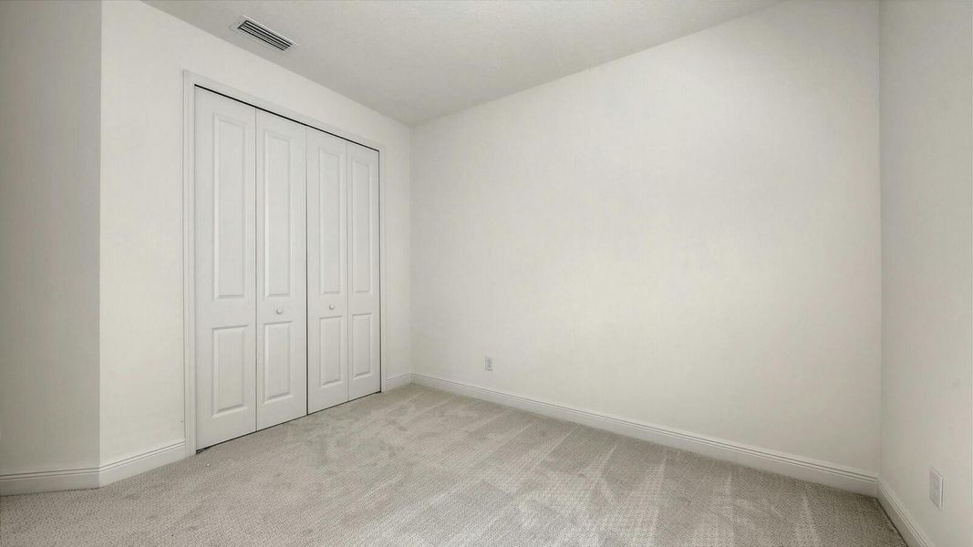 Spacious, unfurnished interior of a new home in Palm Grove Real Estate and Homes for Sale in Lakewood Ranch, FL - Neal Communities, Lakewood Ranch (Image 60).