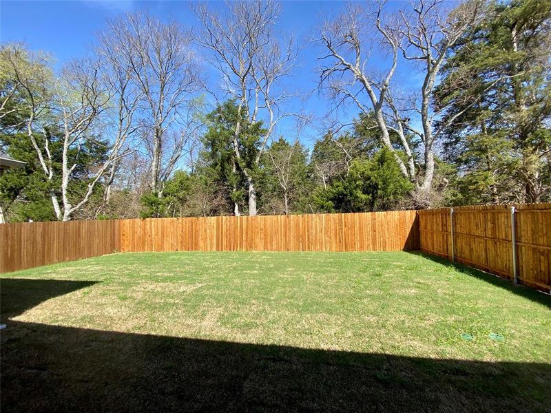 Great private back yard backing to trees!