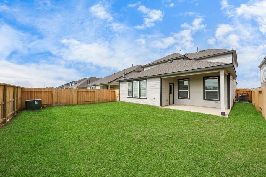 Backyard retreat, offering an abundance of space for kids to play and explore. The possibilities are endless in this outdoor haven, where the joy of open-air activities and family gatherings awaits.