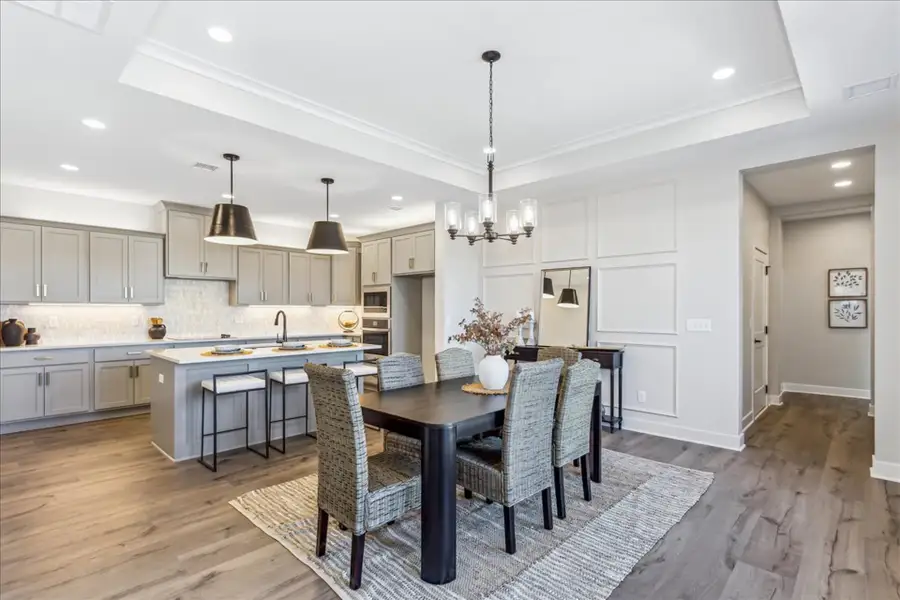 Representative furnished interior of a home built from the Bedford by Perfection Builders in The Courtyards at Cornerstone, Andover (Image 4).